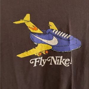 Nike Graphic Tee with Airplane Design Youth